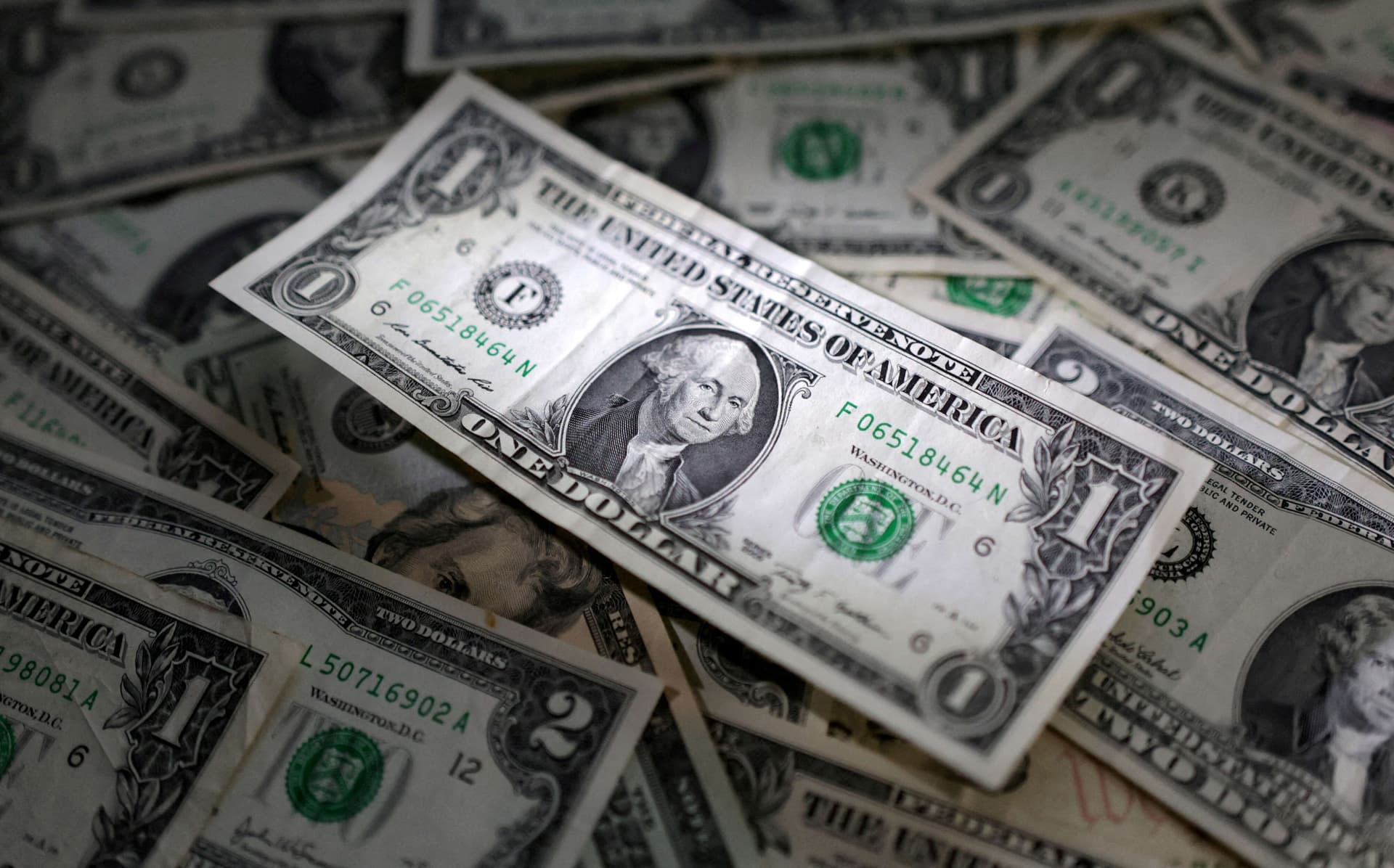 Dollar set for weekly gains as yields surge, Fed bets build