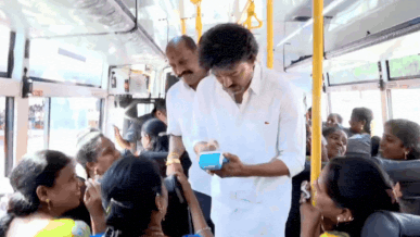 Watch: CM Vijay plays bus conductor, hands out tickets after expanding free travel scheme