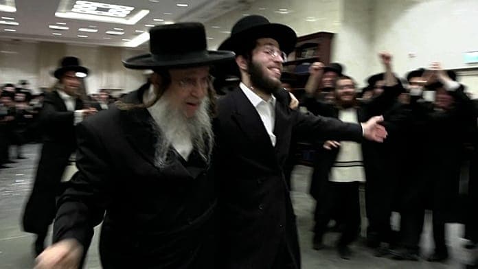 Ultra-Orthodox Jews celebrate Yeshiva student’s release in Elad amid draft dispute