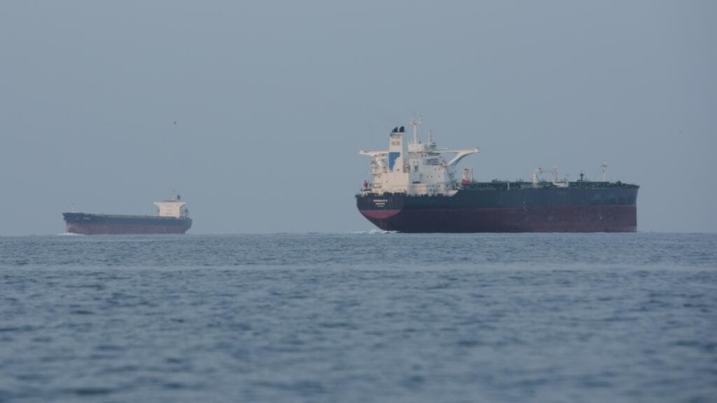 Iranian cargo vessel struck near Qeshm Island as Oman delays Tehran-Gulf talks
