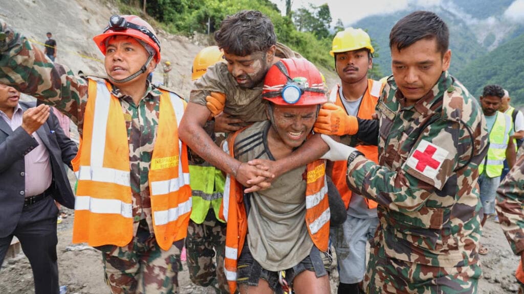 Two trapped workers rescued from mud-clogged tunnel 9 days after Nepal floods