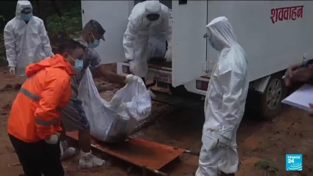 Mass burials held in Nepal as bodies wash up after catastrophic flooding