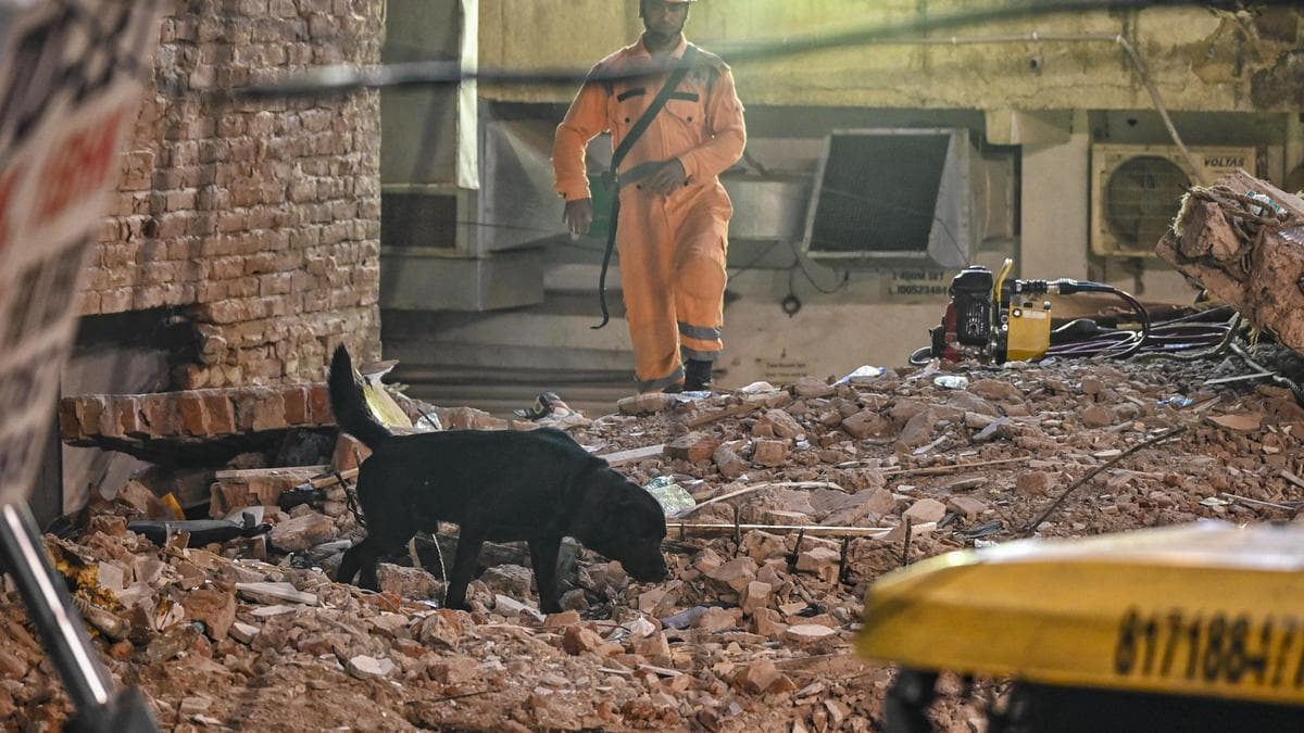 Satya Niketan building collapse: students turn to phones to look for missing friends